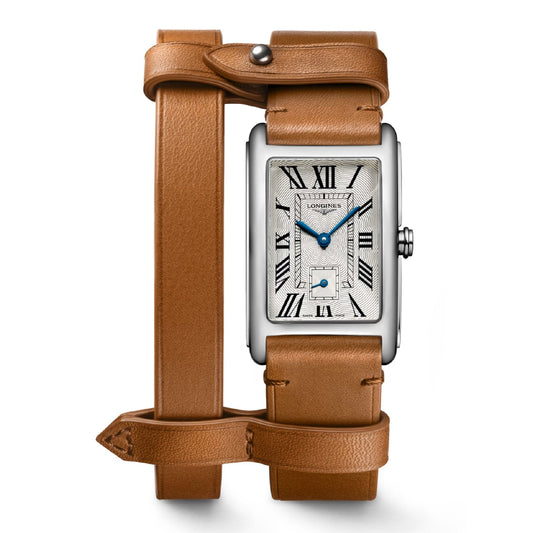 The Longines Dolcevita XYVY Quartz 23.3 x 37mm Watch showcases a rectangular design with a silver face adorned with black Roman numerals and an intricate sub-dial. It features a polished metallic casing complemented by a brown leather strap that elegantly wraps around twice, fastening securely with a button. This model exudes contemporary elegance and offers a unique interpretation of modern style.