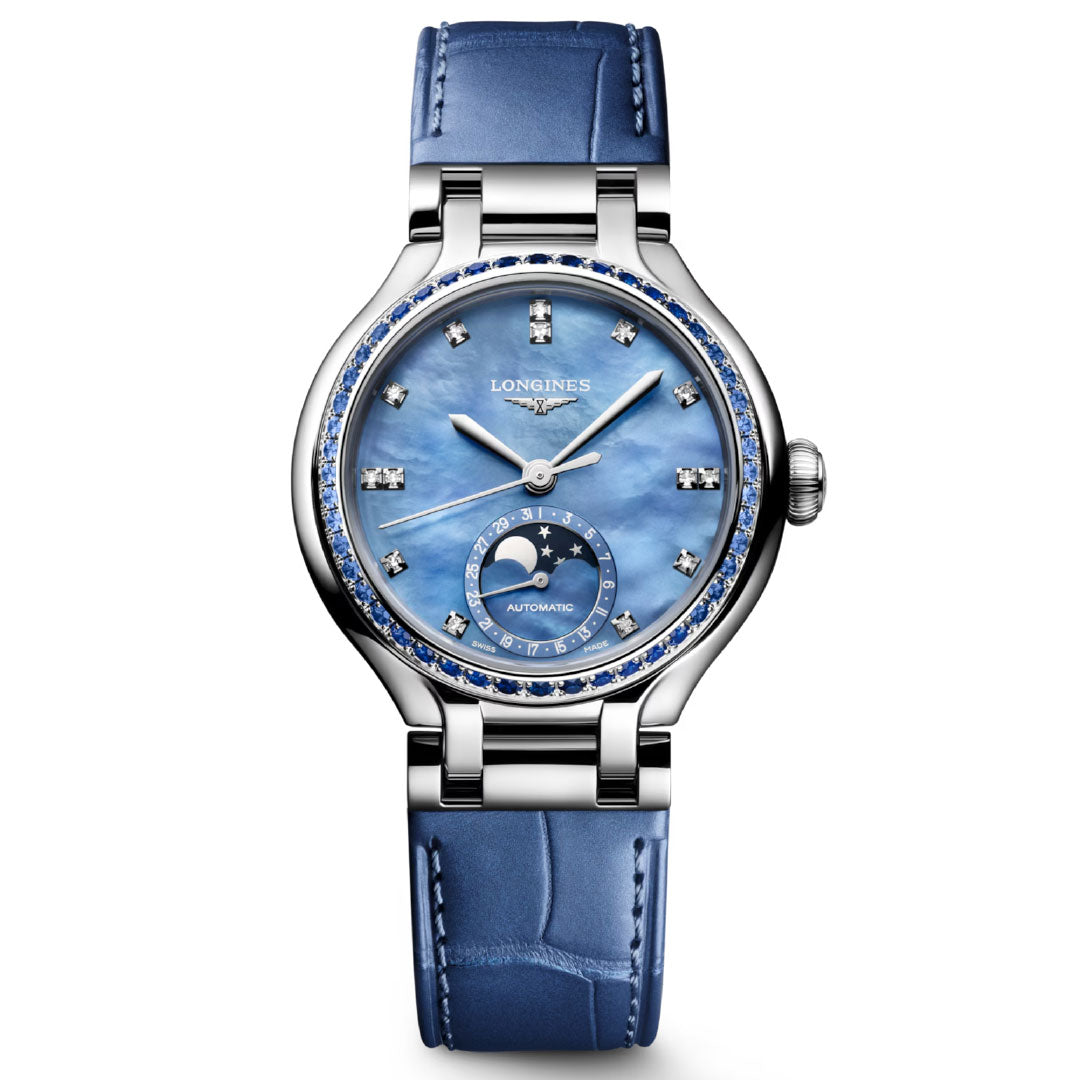 The Longines Primaluna Moonphase Automatic 34mm Watch features a blue leather strap, silver case, blue mother-of-pearl dial with diamond markers, moon phase at 6 o’clock, and gemstone-set bezel—offering elegant luxury for women.
