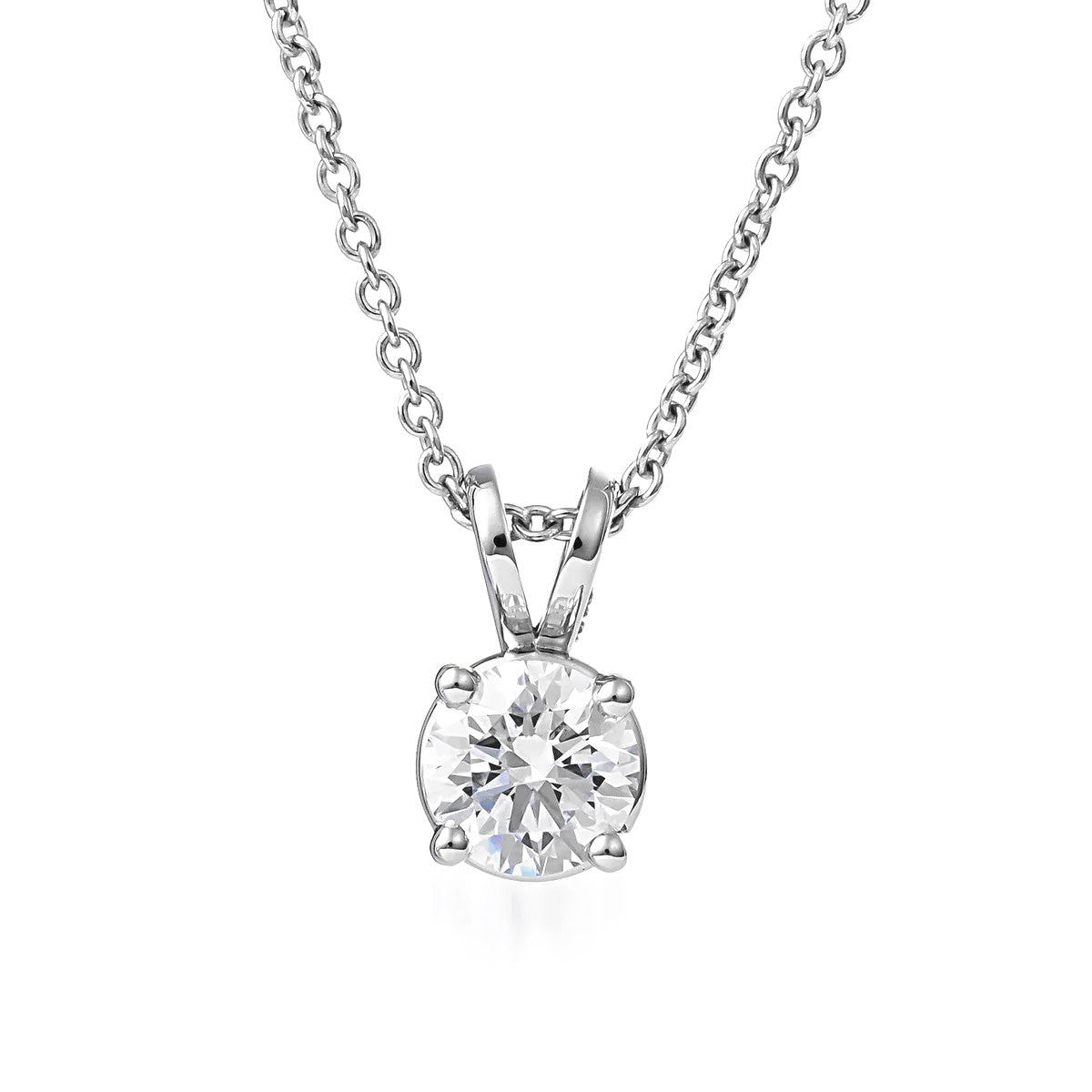 Introducing the Raffi&Co.® 14K White Gold Round Brilliant Lab Diamond Necklace Pendant. This exquisite piece features a stunning brilliant-cut diamond set in a four-prong setting. The 14K white gold chain elegantly complements the radiant centerpiece, offering a blend of simplicity and sophistication that epitomizes the Raffi&Co brand's elegance.