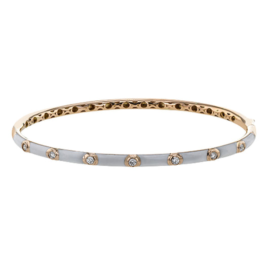 Introducing the Simon G 18K White Gold Diamond Bangle: a delicately crafted accessory adorned with small, evenly spaced diamonds. This exquisite design features a smooth white gold exterior that contrasts elegantly with its gold interior, capturing both elegance and simplicity.