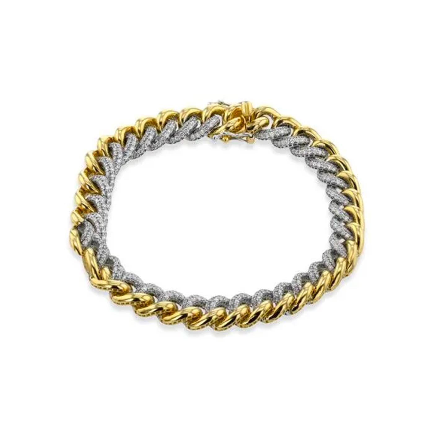 Explore the sophistication of the Simon G. 18K Yellow Gold Diamond Chain Bracelet, which boasts intertwined chains with an enchanting two-tone design. One chain radiates in yellow gold, and the other sparkles in silver, offering a textured and braided appearance. A prominent clasp enhances the elegance of this remarkable piece by Simon G.