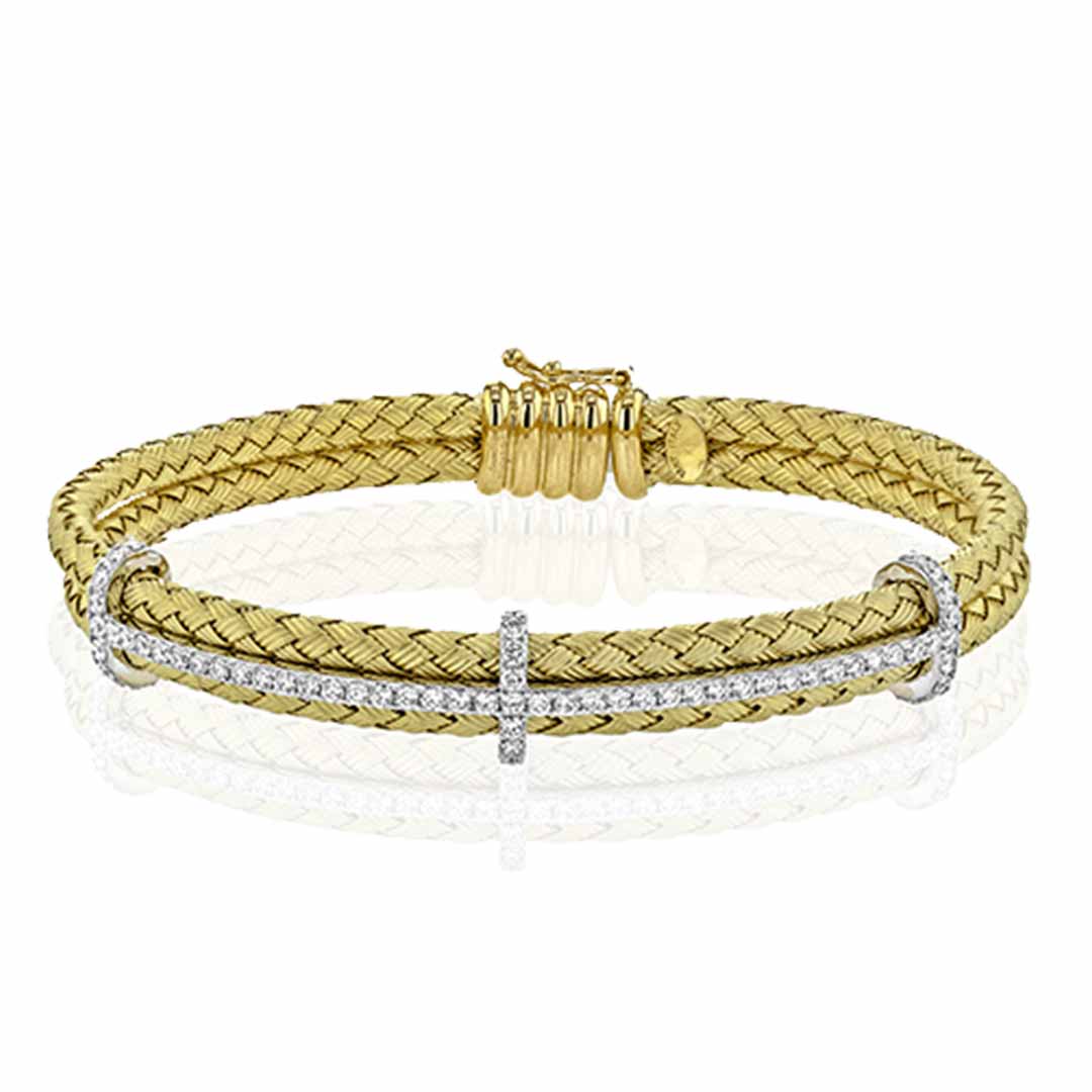 The Simon G. 18K Two Tone Gold Diamond Bracelet showcases a braided design in gold, highlighted by a stunning silver cross accented with round diamonds at the center. Its gold-toned clasp complements the intricate woven details of this sophisticated piece.