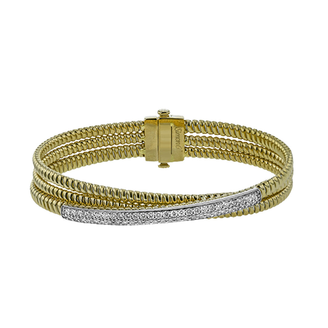 The Simon G. 18K White and Yellow Gold Diamond Bracelet features three twisted bands with a clasp and a round diamond-accented detail, crafted from 18K gold for enduring brilliance.