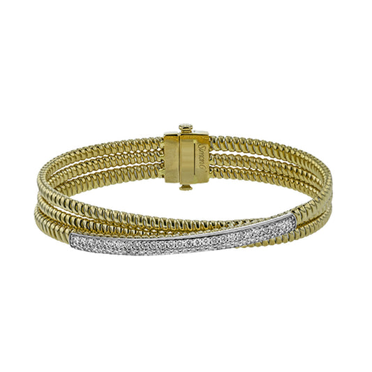 The Simon G. 18K White and Yellow Gold Diamond Bracelet features three twisted bands with a clasp and a round diamond-accented detail, crafted from 18K gold for enduring brilliance.