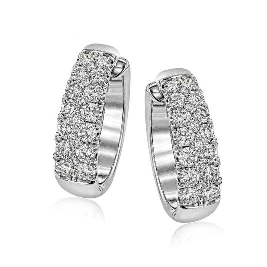 The Simon G. 18K White Gold Diamond Hoop Earrings capture timeless sophistication with their elegant design. Sporting a pavé setting, these earrings are encrusted with round white diamonds creating a glittering surface, while the hoop shape houses a total weight of 2.02 ctw and offers polished, smooth sides for a refined finish.