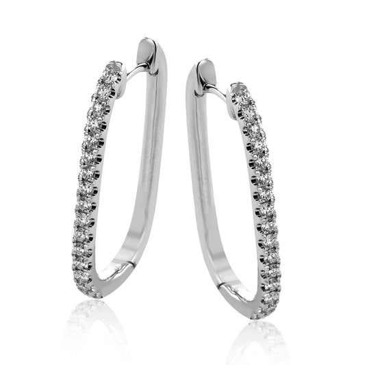 The Simon G. 18K White Gold Diamond Earrings, crafted from 18 Karat white gold by Simon G, feature small sparkling diamonds and an open-ended sleek design that exudes timeless elegance against a white backdrop.
