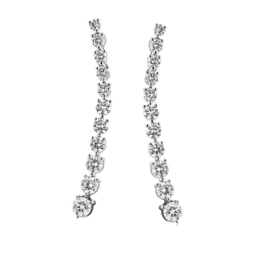 The Simon G. 18K White Gold Diamond Drop Earrings are exquisite creations by Simon G, showcasing a captivating design with sparkling round and marquise-shaped diamonds in an elegant, elongated look.