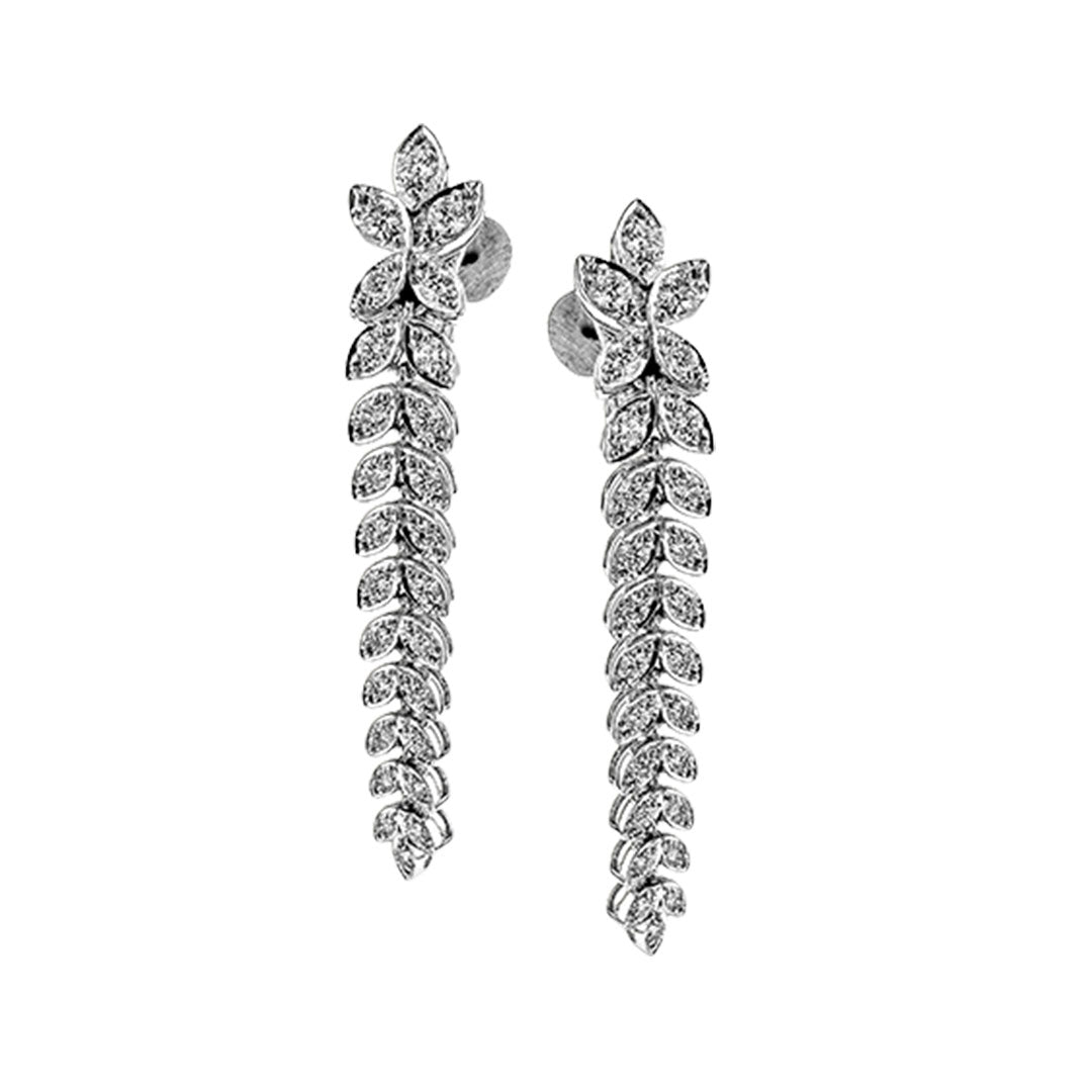 The Simon G. 18K White Gold Diamond Drop Earrings feature a leafy branch design with sparkling round diamonds totaling 1.54 CTW, arranged symmetrically in a cascading pattern.
