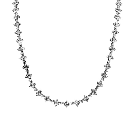 The Simon G. 18K White Gold Diamond Necklace features evenly spaced clusters of round diamonds totaling 8.20 CTW, creating a shimmering pattern along its length. Displayed on a plain white background.
