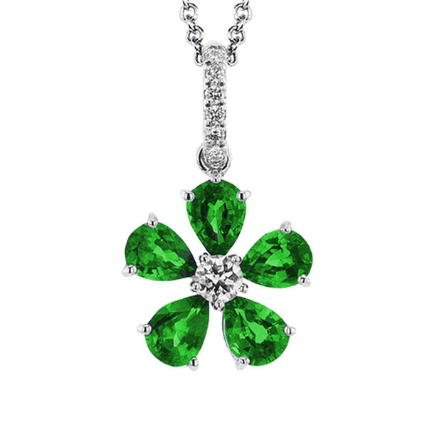 The Simon G. 18K White Gold Diamond and Emerald Flower Necklace Pendant features a clover-shaped design with five emerald gemstones surrounding a central diamond, all elegantly set on an 18K white gold chain. The teardrop petals shimmer beautifully, while the chain is adorned with small diamonds to complete this stunning necklace by Simon G.