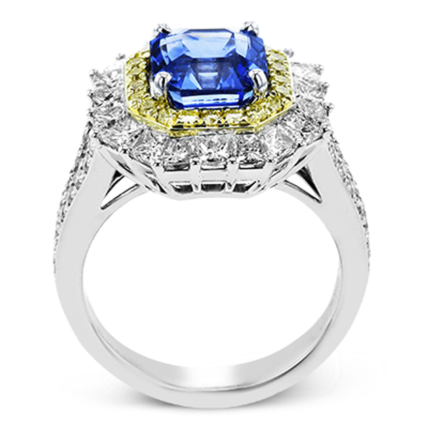 The Simon G. 18K White and Yellow Gold Sapphire with Diamond Fashion Ring highlights a sizable blue sapphire gemstone at its center, surrounded by a halo of small yellow gemstones and an outer layer of clear diamonds. The band, crafted from 18K gold, showcases additional clear diamonds for enhanced elegance.