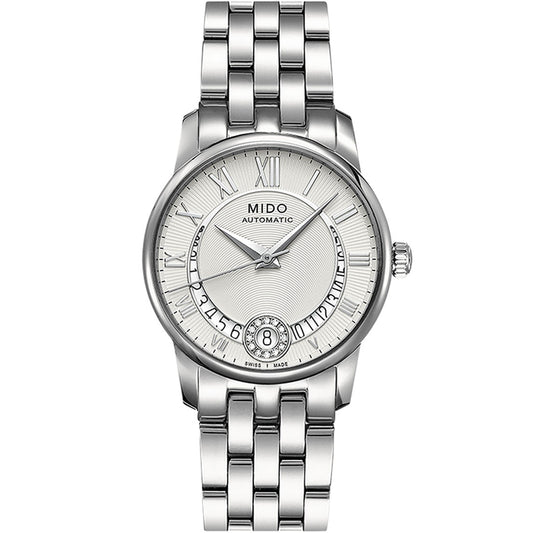 The MIDO Baroncelli II Lady Diamonds Automatic 33mm features a silver metal link band, Roman numerals, a textured white dial, and a date window at 6 o’clock.