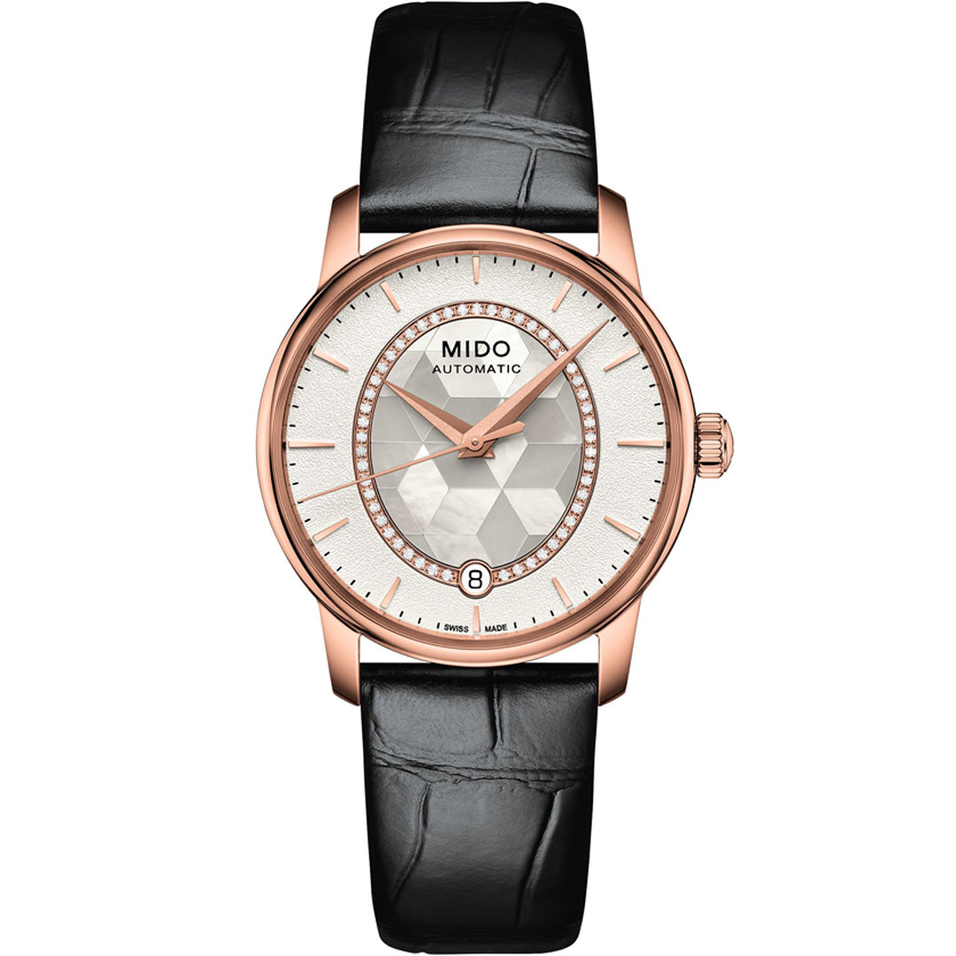 The MIDO Baroncelli II Prisma Automatic 33mm Watch features a rose gold case, white textured dial with gold hour markers, date display at 6 o’clock, and a black leather strap.