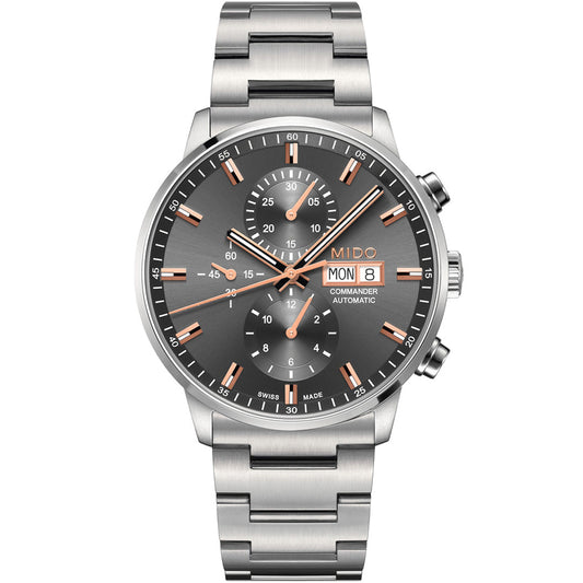 The MIDO Commander Chronograph Automatic 42.5mm Watch features a sunray satin-finished gray dial, rose gold-tone hands and markers, three subdials, and a day-date window at 3 o’clock.