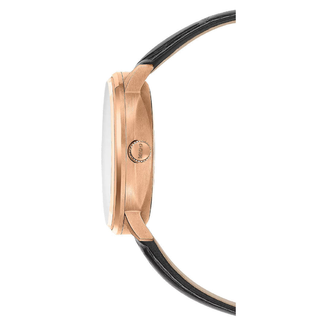 Side view of the MIDO Commander Gradient Automatic 40mm Watch, featuring a round rose gold case, ridged crown, and black leather strap. The transparent acrylic dial with Caliber 80 movement is not visible in this image.