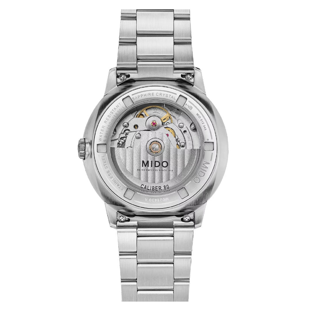 Back view of the MIDO Commander Datoday Automatic 40mm Watch, featuring a transparent case back that reveals the Caliber 80 movement, an elegant stainless steel bracelet, and the signature day-date display.