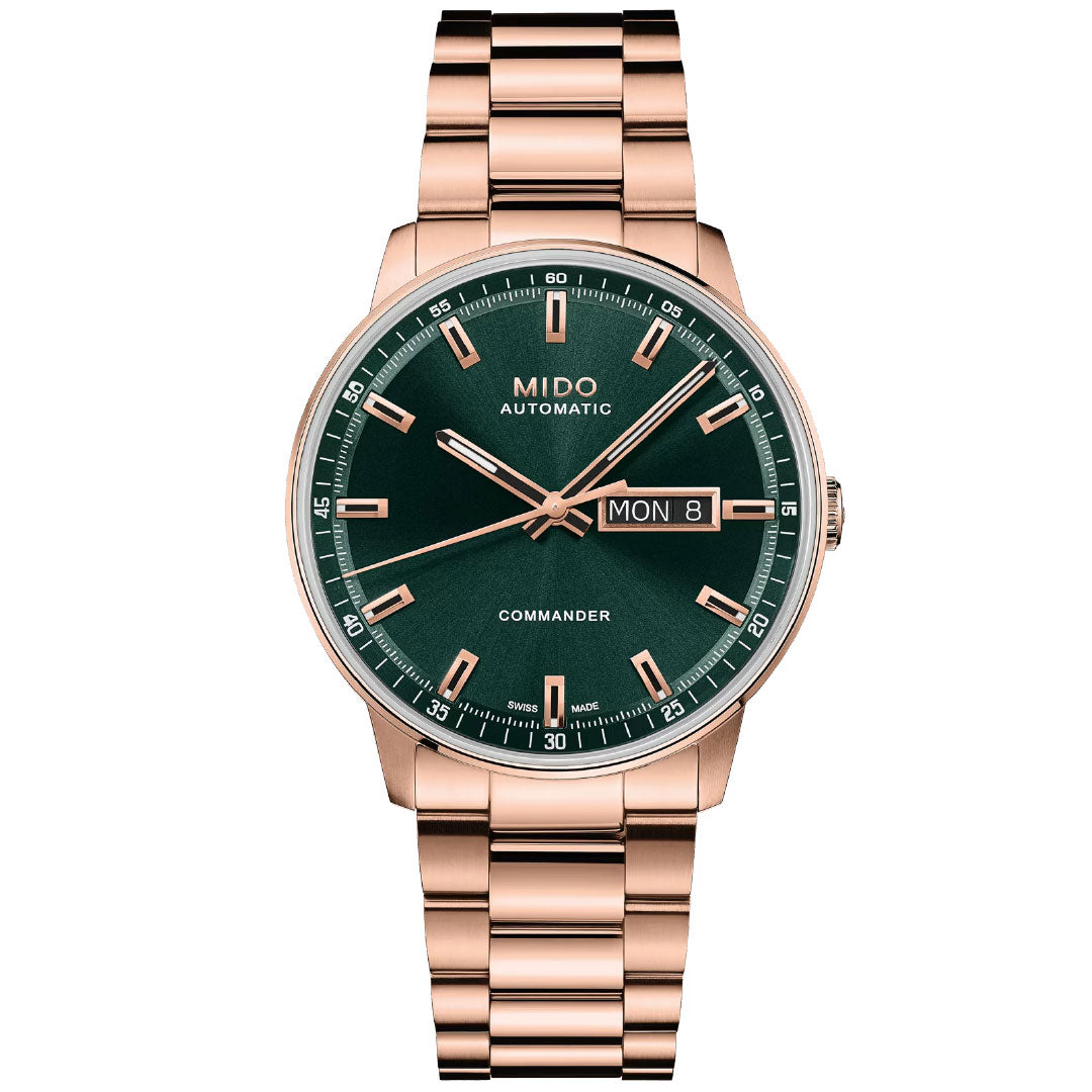 The MIDO Commander Datoday Automatic 40mm Watch features a rose gold stainless steel case, green dial, gold markers and hands, day-date display at 3 o'clock, and a metal link bracelet for classic elegance.
