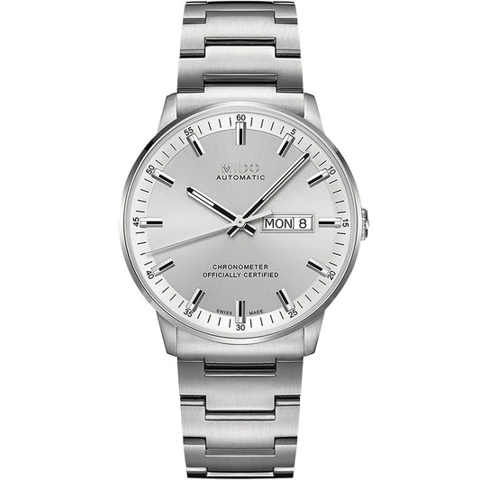 The MIDO Commander Chronometer Automatic 40mm Watch features a silver metal band, white dial, black markers and hands, with day/date display at 3 o’clock and “Chronometer Officially Certified” on the face.