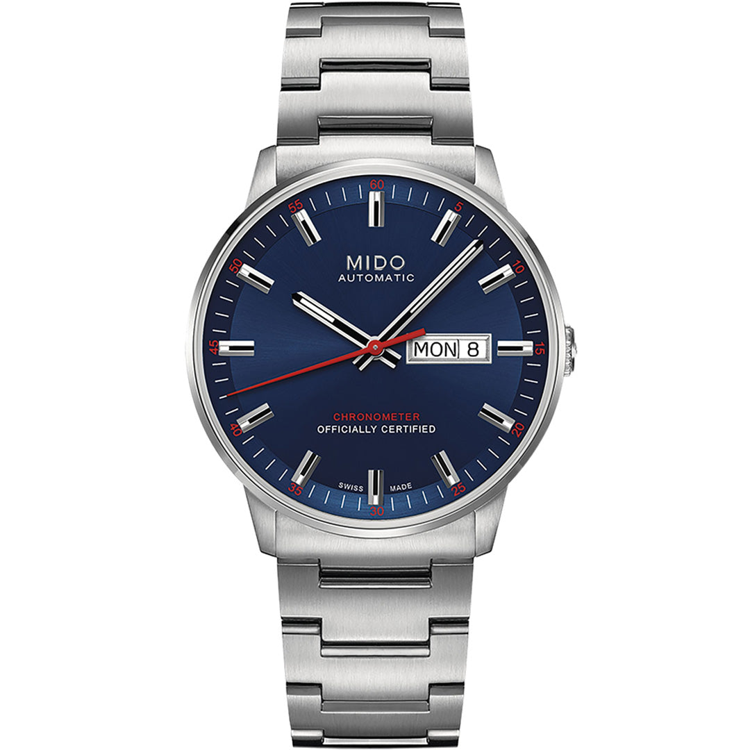 The MIDO Commander Chronometer Automatic 40mm Watch features a silver metal band, blue dial, silver hour markers, red-tipped second hand, and a day-date display showing "MON 8" on the right.