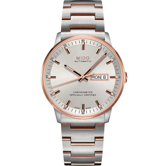 The MIDO Commander Chronometer Automatic 40mm Watch features a silver and rose gold metal band, round face, automatic movement, day-date display (showing "MON 8"), and a dial reading “Chronometer Officially Certified.”.