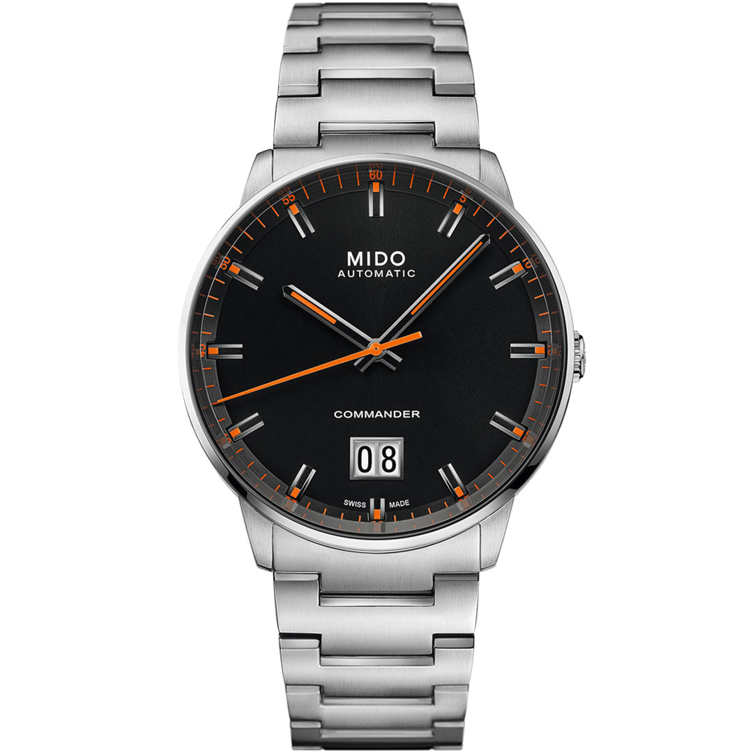 The MIDO Commander Big Date Automatic 42mm Watch features a stainless steel case, black dial with orange accents, silver markers, Caliber 80 movement, date at 6 o’clock, and a metal link bracelet. “MIDO AUTOMATIC” is labeled on the face.