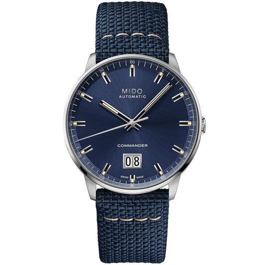 The MIDO Commander Big Date Automatic 42mm Watch features an 80-hour power reserve, blue textured strap and dial, silver markers and hands, a large date window at 6 o’clock, all powered by the Caliber 80 movement.
