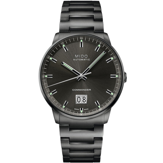 The MIDO Commander Big Date Automatic 42mm Watch features a dark metallic bracelet, black sunburst dial, silver markers and hands, large date at 6 o'clock, and is powered by the precise Caliber 80 movement.
