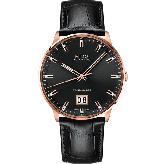 The MIDO Commander Big Date Automatic 42mm Watch features a Caliber 80 movement, black leather strap, black dial, rose gold case, white date display at 6 o'clock, and silver hour markers with "COMMANDER" above the date.