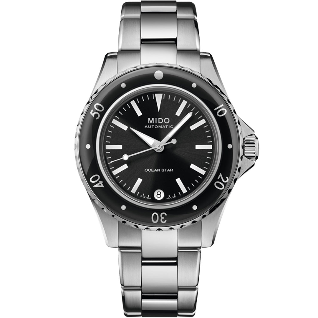 The MIDO Ocean Star 36.5 Automatic 36.5mm Watch features a stainless steel case, Swiss automatic movement, black dial with silver markers, black bezel with white numerals, and a date display at 6 o’clock.