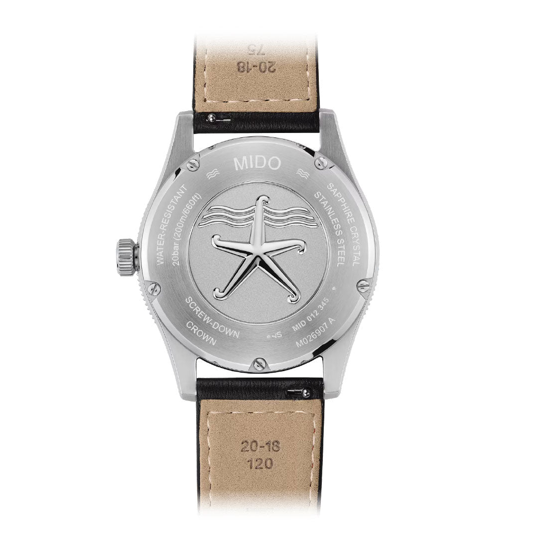 The back of the MIDO Ocean Star 200 Automatic 42.5mm Watch by MIDO showcases an embossed starfish on its stainless steel case, with engraved details and a partially visible black and tan leather strap, emphasizing its water resistance.