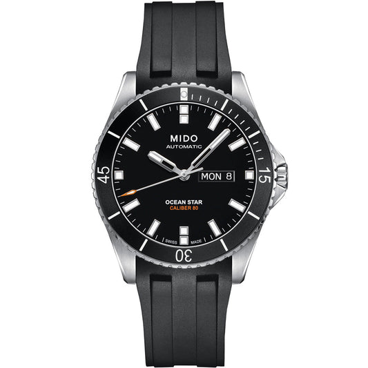 The MIDO Ocean Star 200 Automatic 42.5mm Watch features a black dial, luminous markers, silver bezel, black rubber strap, and shows day-date at 3 o’clock. This MIDO watch is water-resistant and stylishly designed for durability.
