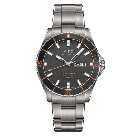The MIDO Ocean Star 200 Automatic 42.5mm watch features a titanium case, automatic movement, gray dial with orange accents, silver markers, day/date display at 3 o'clock, metal link band, and is water resistant.