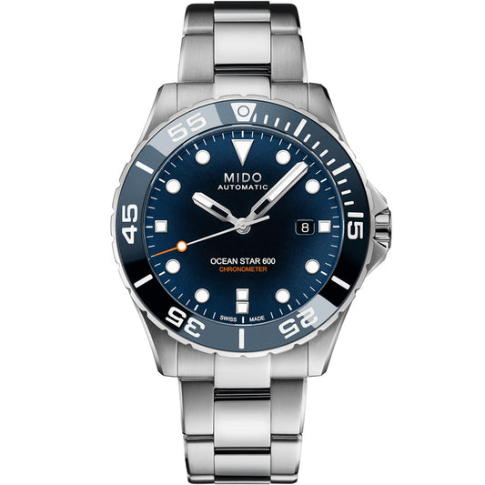 The MIDO Ocean Star Diver 600 Chronometer Automatic 43.5mm Watch features a stainless steel case, blue dial, white hour markers, COSC-certified movement, date at 3 o’clock, and a unidirectional ceramic bezel.