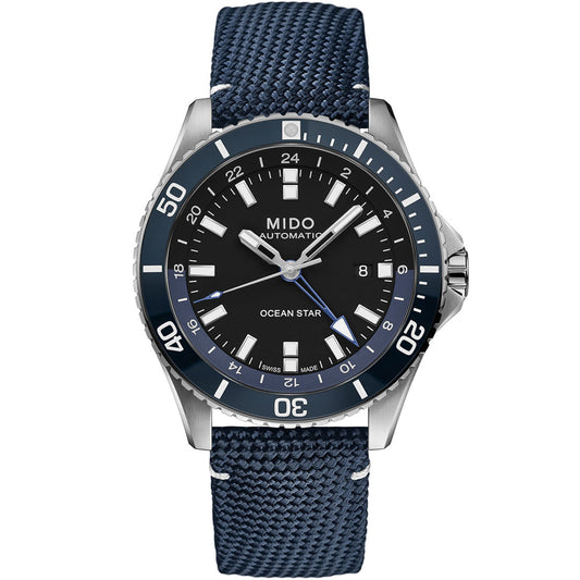 The MIDO Ocean Star GMT Automatic 44mm Watch features a black dial, blue rotating bezel, silver hour markers, date window at 3 o'clock, Caliber 80 movement, and a textured blue strap.
