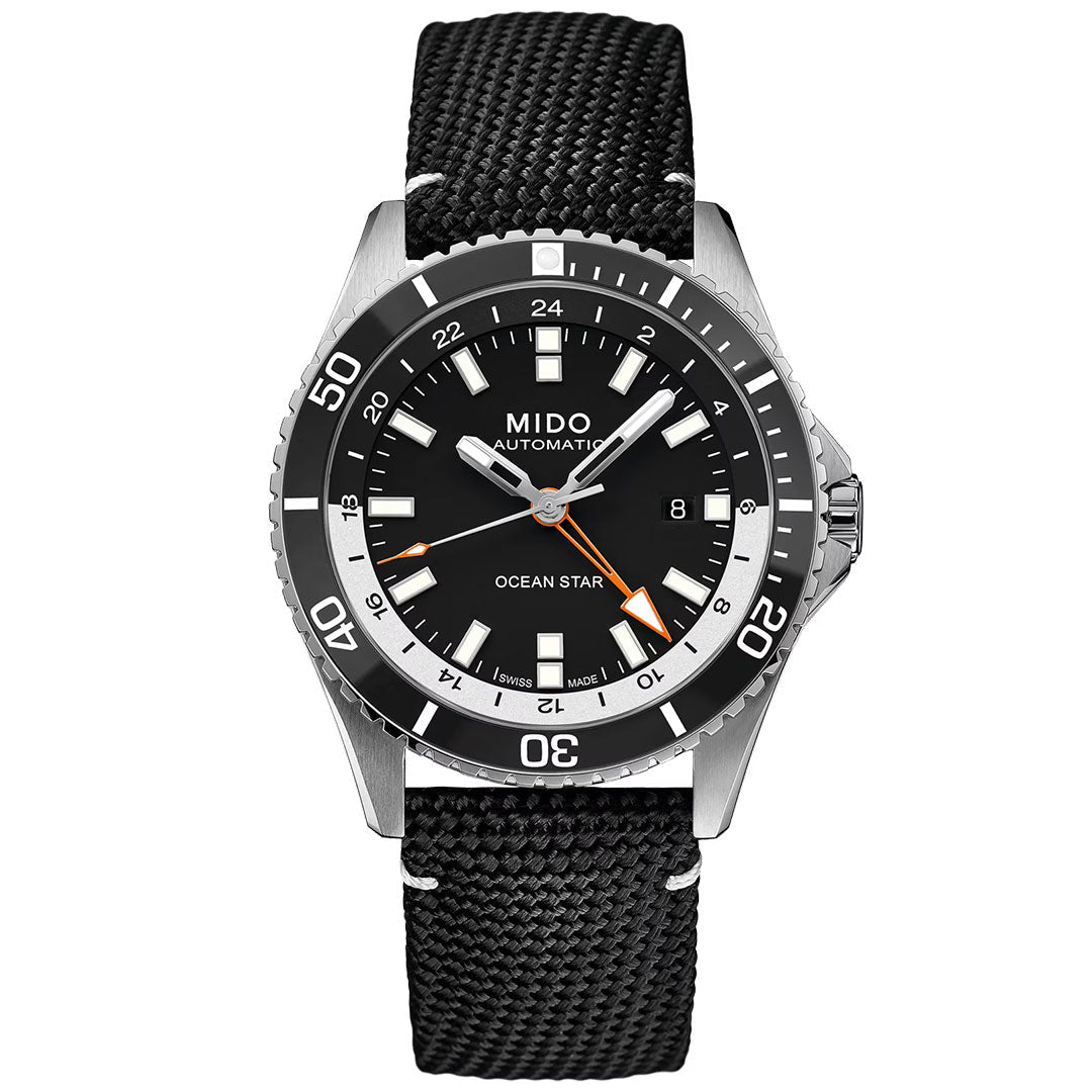 The MIDO Ocean Star GMT Automatic 44mm Watch features a sophisticated Swiss automatic movement, a black textured strap, black dial with silver markers and orange accents, a date window at 3 o’clock, and a rotating bezel. This timepiece from MIDO’s Ocean Star collection seamlessly blends robust diving functionality with refined style.