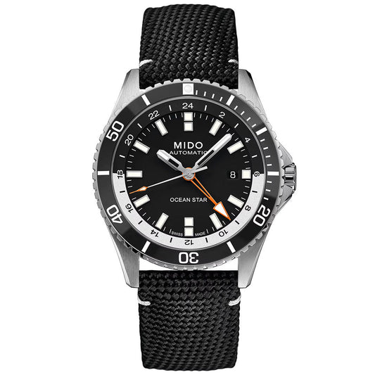 The MIDO Ocean Star GMT Automatic 44mm Watch features a sophisticated Swiss automatic movement, a black textured strap, black dial with silver markers and orange accents, a date window at 3 o’clock, and a rotating bezel. This timepiece from MIDO’s Ocean Star collection seamlessly blends robust diving functionality with refined style.