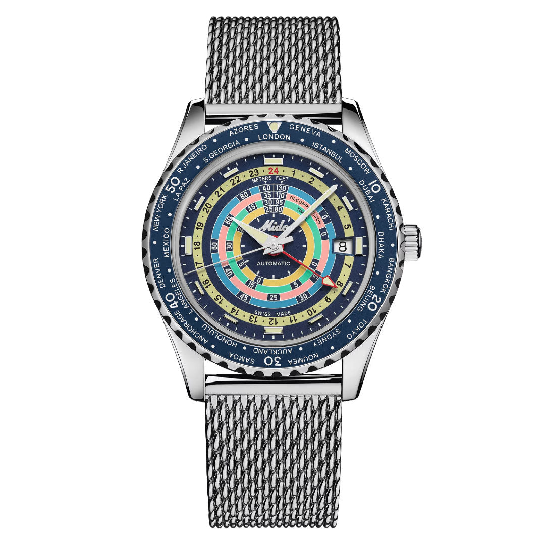 The MIDO Ocean Star Decompression World Timer Automatic 40.5mm Watch features a silver mesh band, vibrant circular dial, blue bezel with world cities, GMT function for multiple time zones, and clear hands with a visible date window.