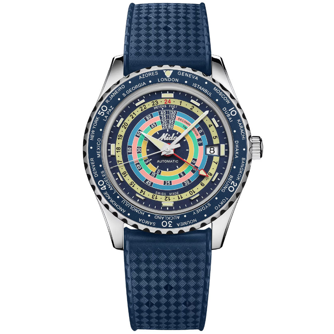 The MIDO Ocean Star Decompression World Timer Automatic 40.5mm Watch features a blue textured strap, multicolored concentric ring dial with city names and date at 3 o’clock, plus a bezel marking time zones for global cities.
