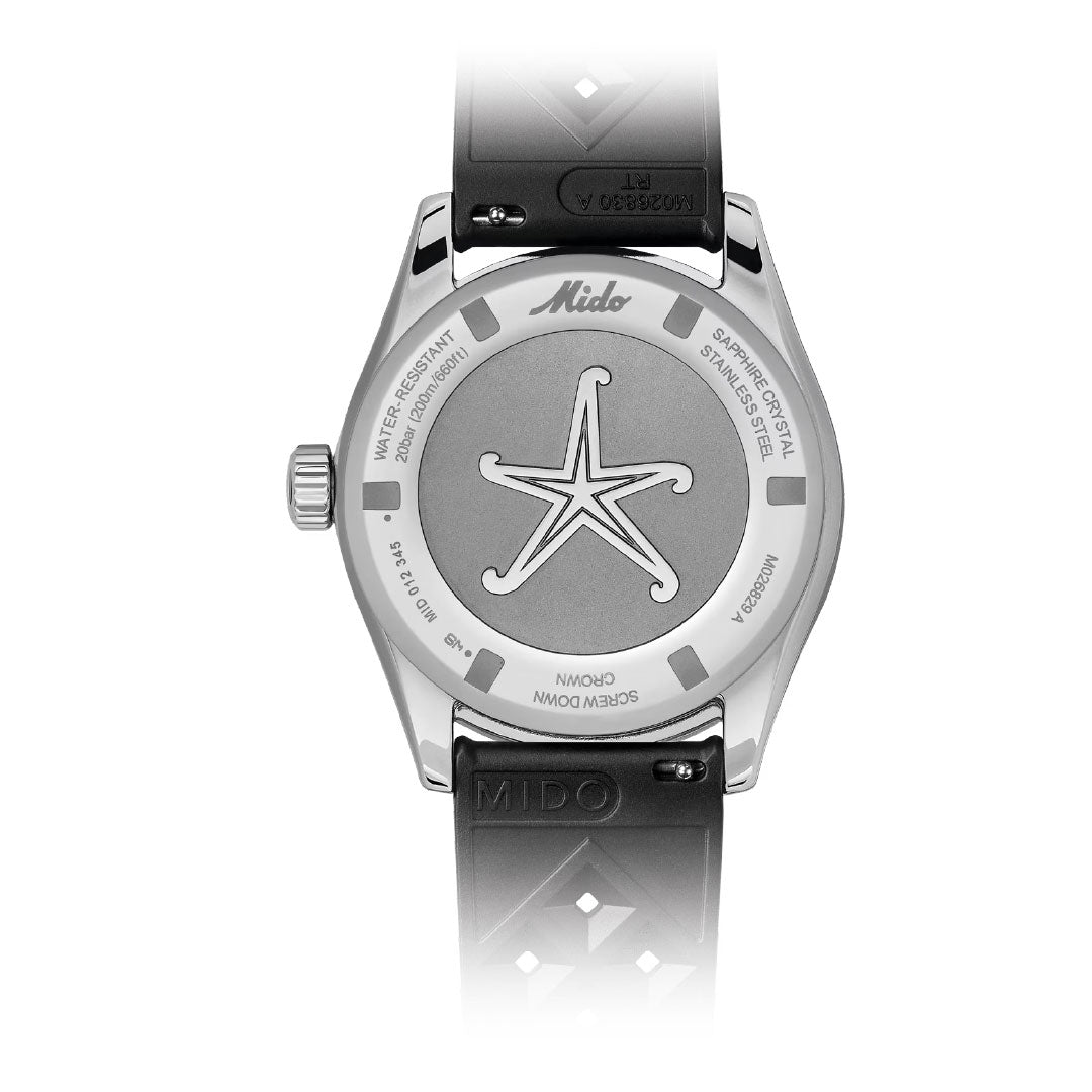 The MIDO Ocean Star Decompression World Timer Automatic 40.5mm Watch features a black strap and a stainless steel case back engraved with a starfish, showcasing its technical details around the edge.