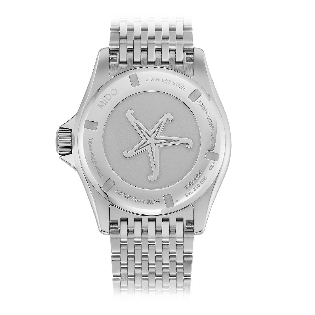 The MIDO Ocean Star Tribute Automatic 40.5mm Watch, featuring a stainless steel link band, is shown from the back with an engraved starfish and specification text on the case back.