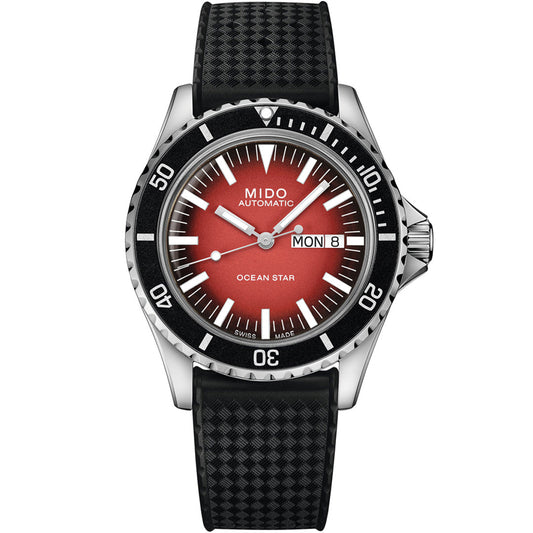 The MIDO Ocean Star Tribute Gradient Automatic 40.5mm Watch features a black textured strap, red gradient dial, silver hands, a black rotating bezel with white numerals, and displays the day and date.