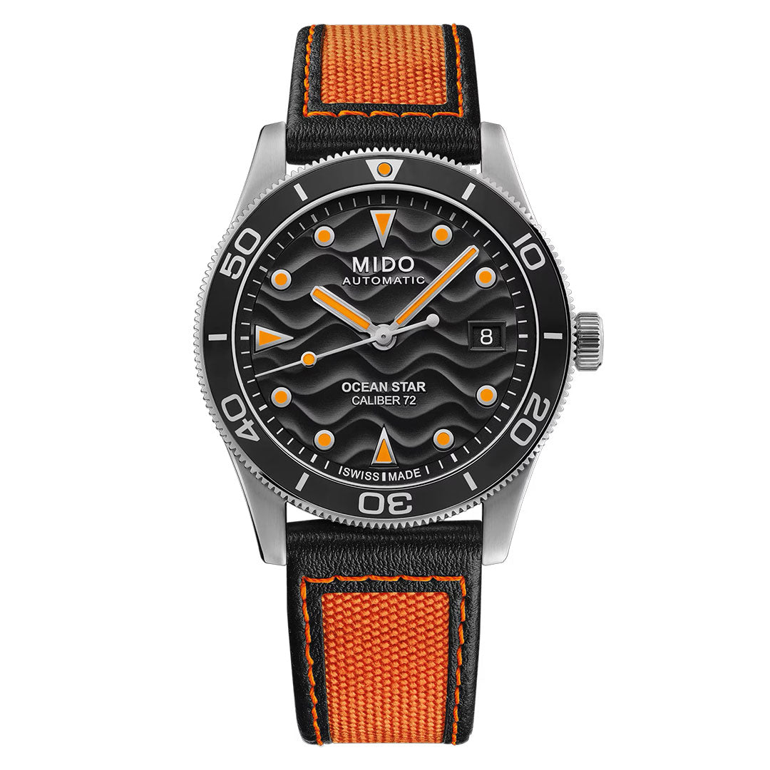 The MIDO Ocean Star 39mm Automatic Watch features a black wavy-pattern dial accented by orange hour markers, a date window, and is paired with a black leather strap detailed with orange stitching. Water-resistant and designed for everyday practicality, this bold timepiece by MIDO offers both style and functionality.