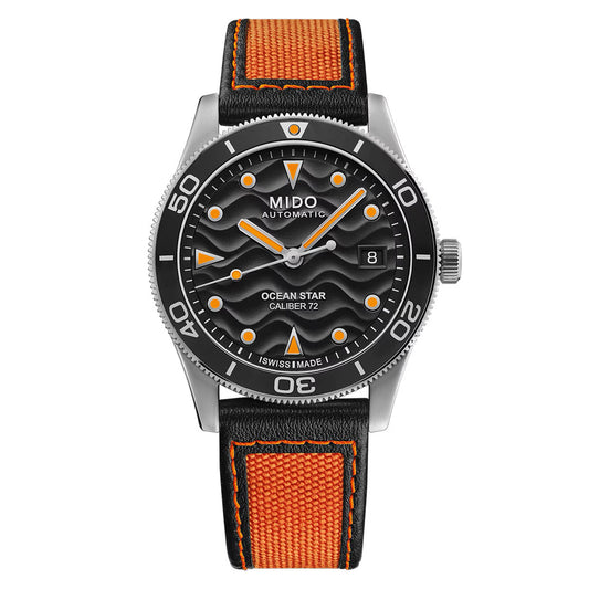 The MIDO Ocean Star 39mm Automatic Watch features a black wavy-pattern dial accented by orange hour markers, a date window, and is paired with a black leather strap detailed with orange stitching. Water-resistant and designed for everyday practicality, this bold timepiece by MIDO offers both style and functionality.