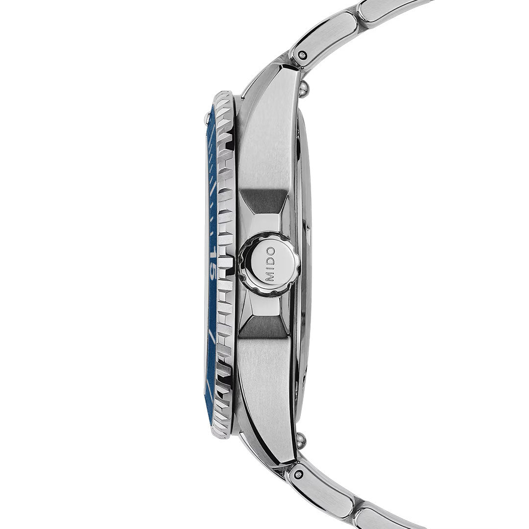 Side view of the MIDO Ocean Star 200 Automatic 41mm Watch in silver stainless steel with a blue bezel, textured and polished case, "MIDO" crown, and bracelet links—all underscoring its water-resistant design.