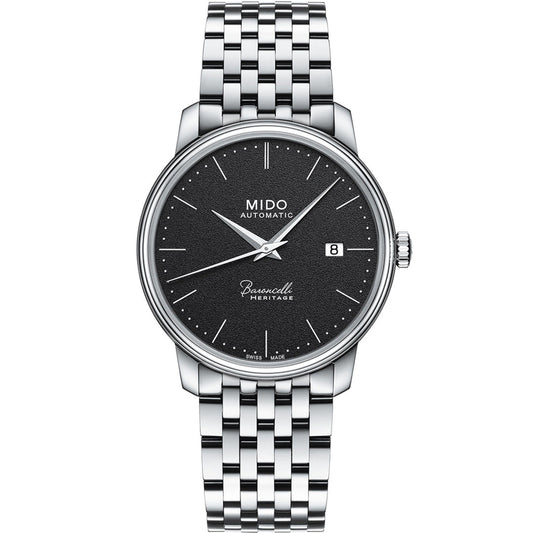 The MIDO Baroncelli III Heritage Gent Automatic 39mm watch features a black textured dial, silver markers and hands, a date at 3 o'clock, and a polished silver bracelet—elegant style with automatic movement from MIDO.