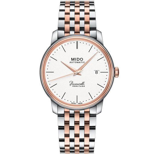 The MIDO Baroncelli III Heritage Gent Automatic 39mm Watch features a round white dial, rose gold accents, a date window at 3 o’clock, and a two-tone silver and rose gold bracelet for timeless elegance.