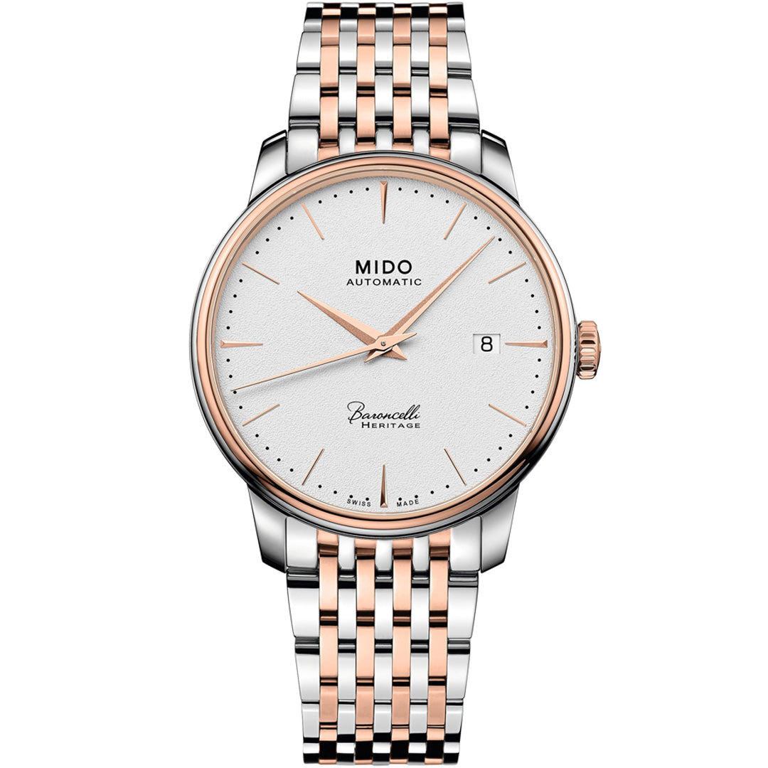 The MIDO Baroncelli Heritage Automatic 39mm Watch features a silver and rose gold two-tone bracelet, white dial with thin gold hour markers, date window at 3 o'clock, and "MIDO Automatic" on the face.