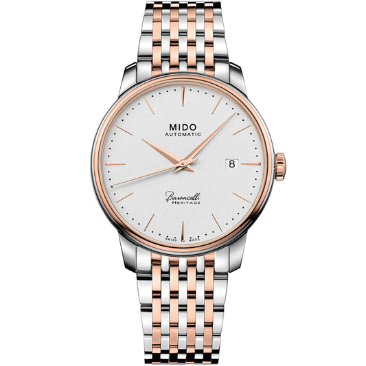 The MIDO Baroncelli Heritage Automatic 39mm Watch features a silver and rose gold two-tone bracelet, white dial with thin gold hour markers, date window at 3 o'clock, and "MIDO Automatic" on the face.