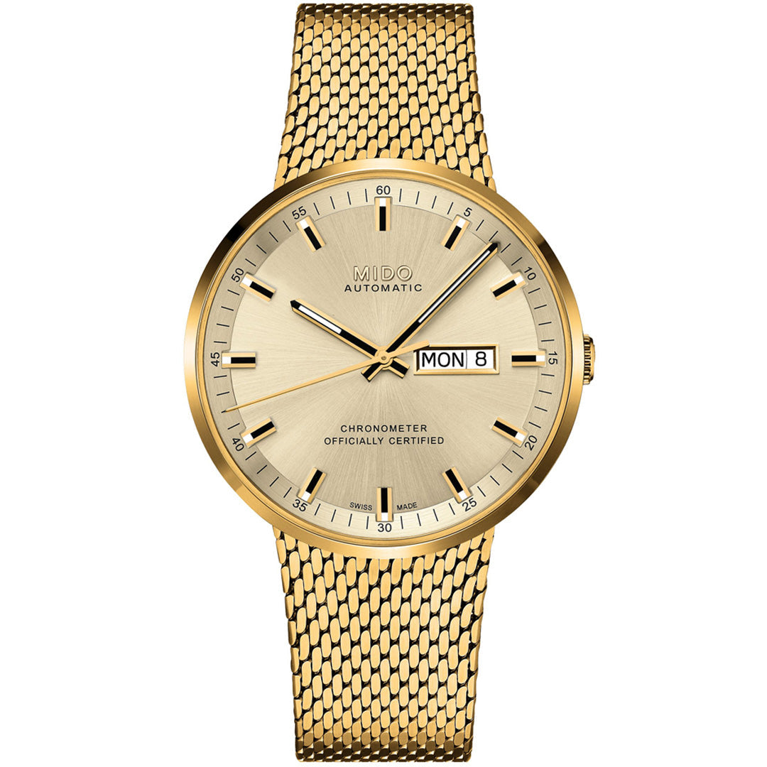 The MIDO Commander Icône Automatic 42mm Watch features a gold Milanese mesh bracelet, gold dial with stick markers, day-date display reading "MON 8," and "Chronometer Officially Certified" on the lower dial.