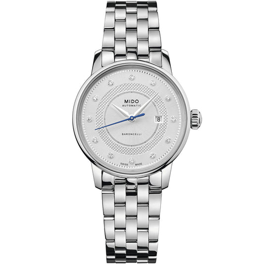 The MIDO Baroncelli II Signature Lady Automatic 30mm Watch features a stainless steel bracelet, white dial with blue hands, diamond hour markers, date at 3 o’clock, and “MIDO AUTOMATIC” on the face.